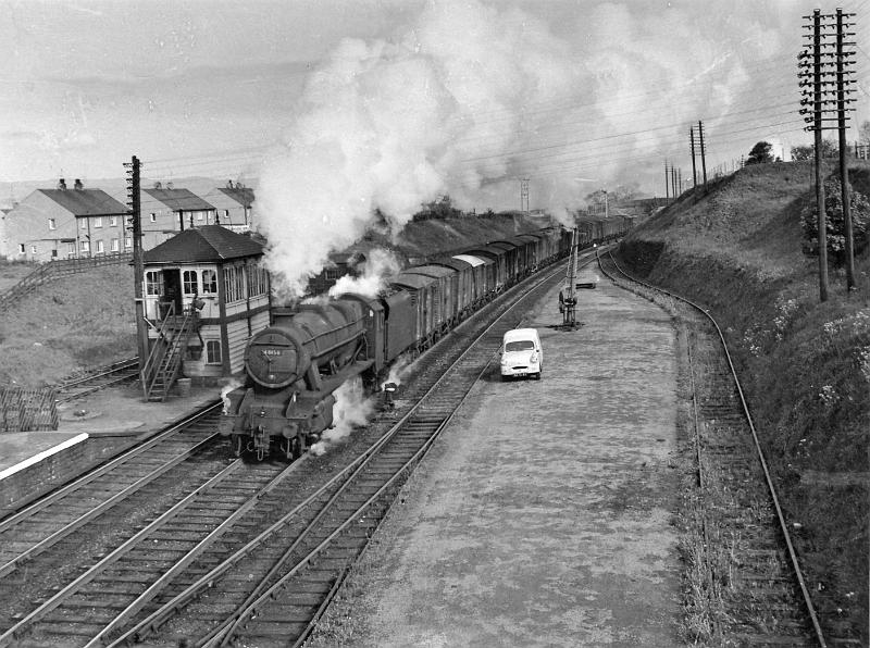 Loco 48158.jpg - Number  48158   - 8F-A   2-8-0  - Photographed on 21st May 1962 Designed by William Stanier.   Build in 1940 at Crewe for the LMS Railway.    A total of 852 class 8Fs were built between 1935 and 1946 at numerous works thoughout the country ;  they were designed for hauling heavy freight. It was shedded at Nottingham in 1948. Its last shed was Holbeck and withdrawn  on 9th September 1967.